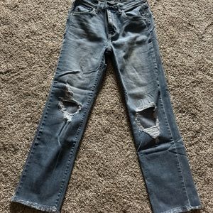 Levi’s cropped fringe light wash jeans